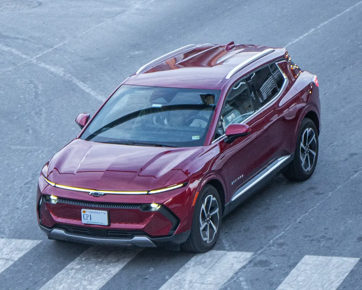Red Chevrolet Equinox EV in the Washington DC area; the 2027 Chevy Equinox EV keeps this design