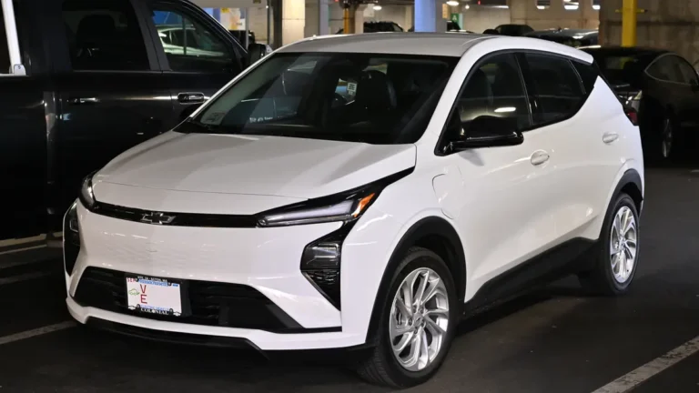 White 2027 Chevrolet Bolt LT in a parking garage, one of the cheapest Tesla alternatives in the US