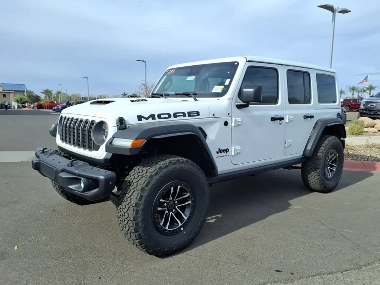 White 2026 Jeep Wrangler Unlimited Moab 392 at an Arizona dealership, the trim at the center of owner reports about 2027 Jeep Wrangler colors