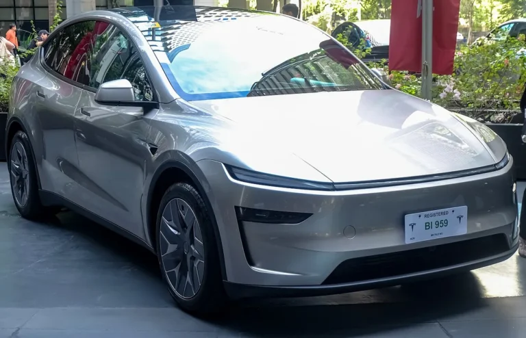 Cosmic Silver Tesla Model Y L Premium AWD on display, the six-seat SUV at the center of Model Y L Zen Grey dashboard complaints