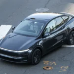 Black Tesla Model Y in Washington, DC, the kind of owner car the Tesla Robotaxi app code would enroll