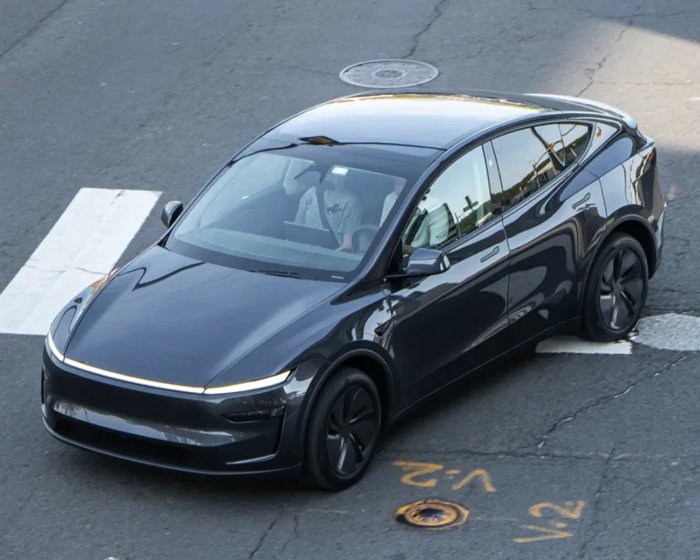 Black Tesla Model Y in Washington, DC, the kind of owner car the Tesla Robotaxi app code would enroll