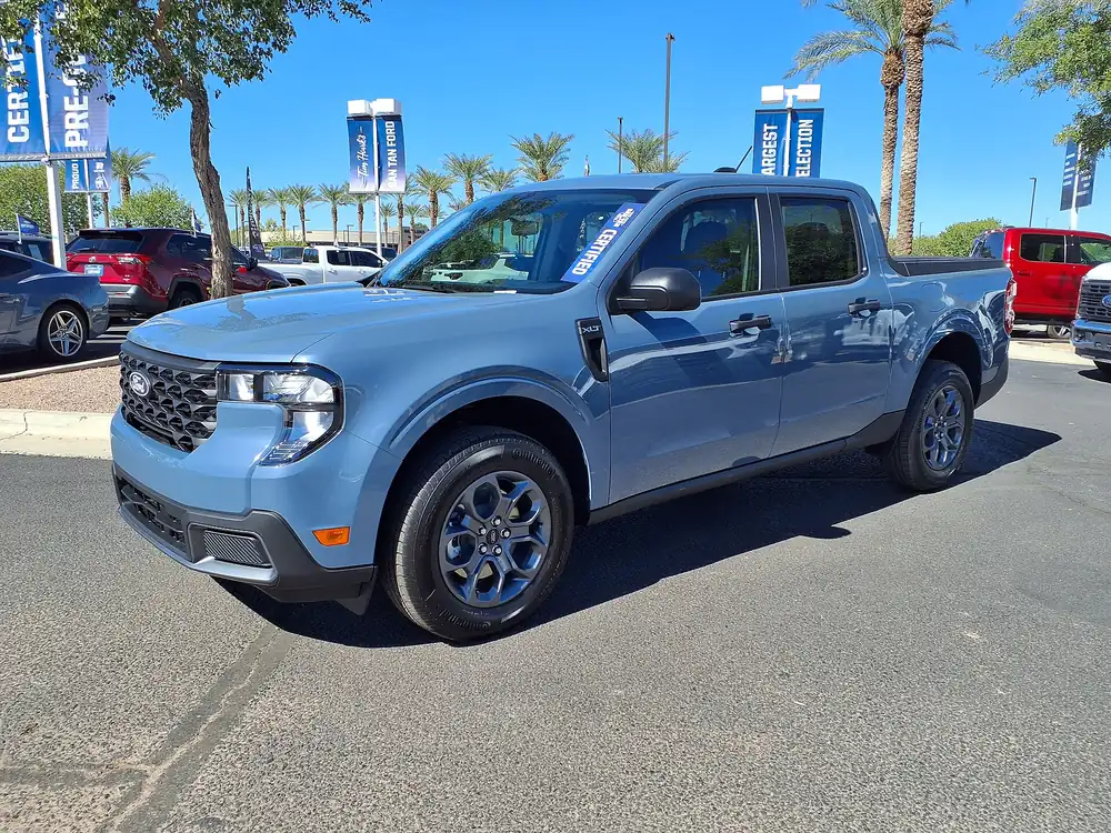 2025 Ford Maverick XLT at a dealer lot, the small Ford pickup whose early markups worry Ford Fathom buyers