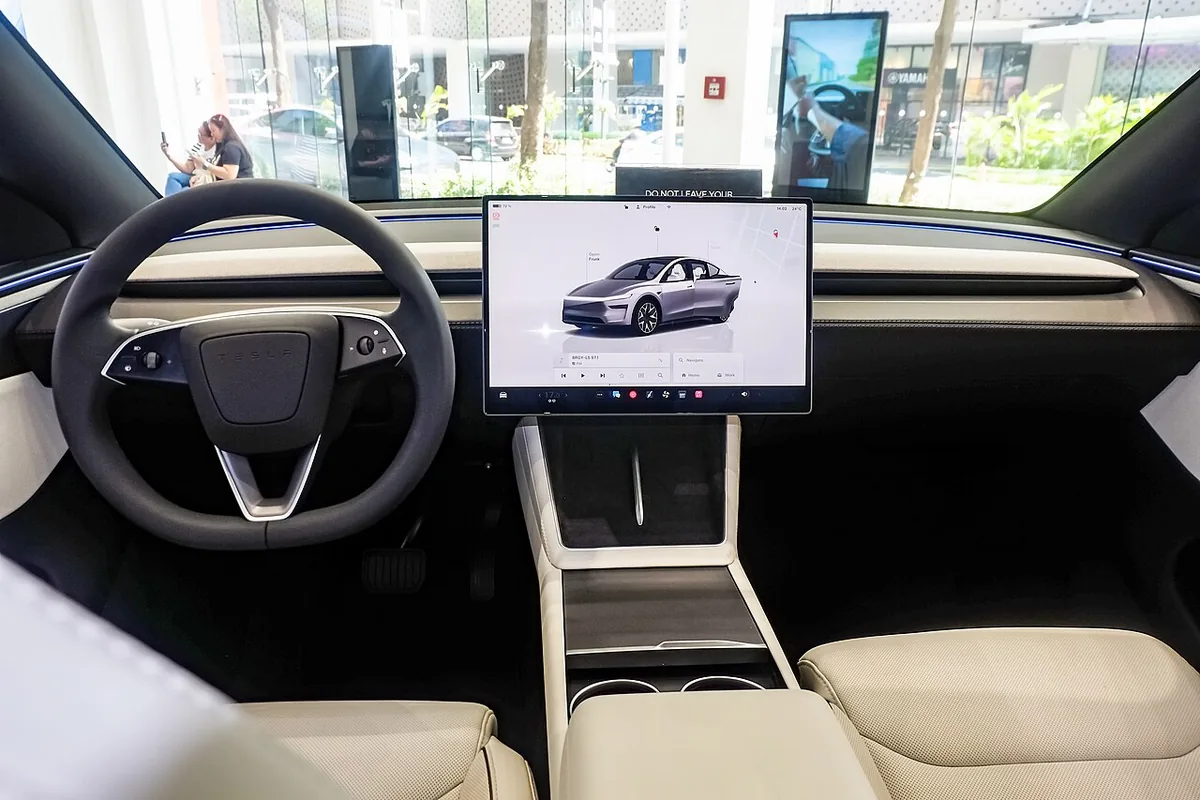 Light-colored Tesla Model Y L interior and dashboard, similar in tone to the Model Y L Zen Grey cabin US buyers ordered