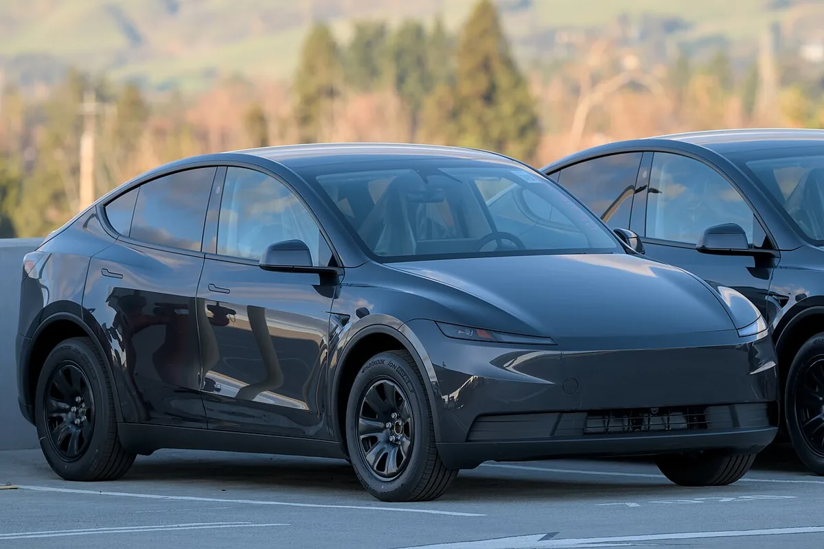 Gray Tesla Model Y Standard parked outdoors, one of the trims affected by the Tesla Model Y APR increase to 2.49%