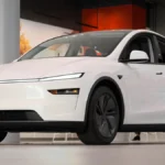 White Tesla Model Y, the core of the 2027 Tesla lineup, parked at Santana Row