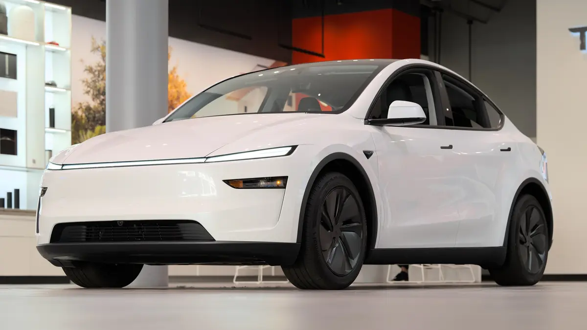 White Tesla Model Y, the core of the 2027 Tesla lineup, parked at Santana Row