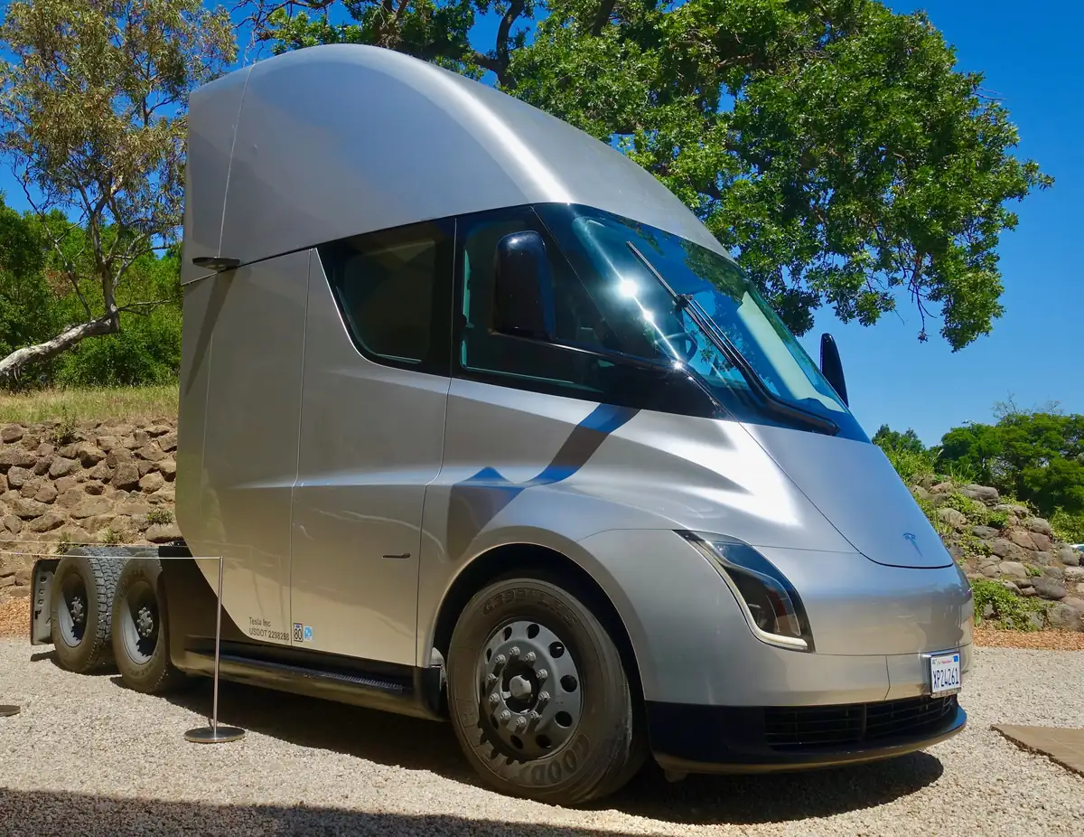 Silver Tesla Semi electric tractor without a trailer; the Tesla Semi price is reported at about $290,000