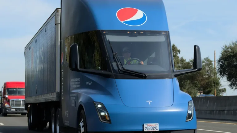 Blue PepsiCo Tesla Semi on the road; the Tesla Semi price is reported at about $290,000