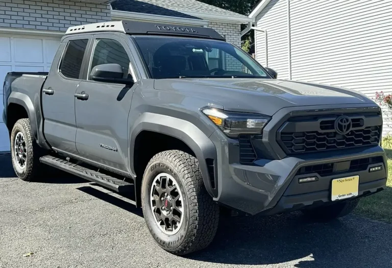 Gray 2024 Toyota Tacoma TRD Off-Road parked in a driveway, front three-quarter view; Toyota Remote Connect is $8 a month again